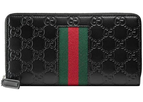 black Gucci signature zipper wallet